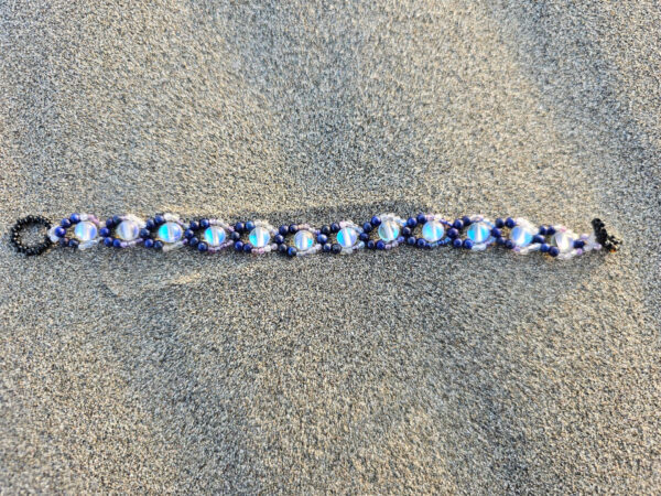 Mystical Gaze gemstone bracelet full length at the beach