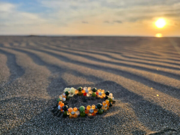 Flower of Life in a circle at sunset