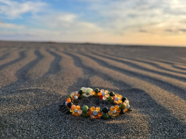 Flower of Life on a sandy beach in a circle